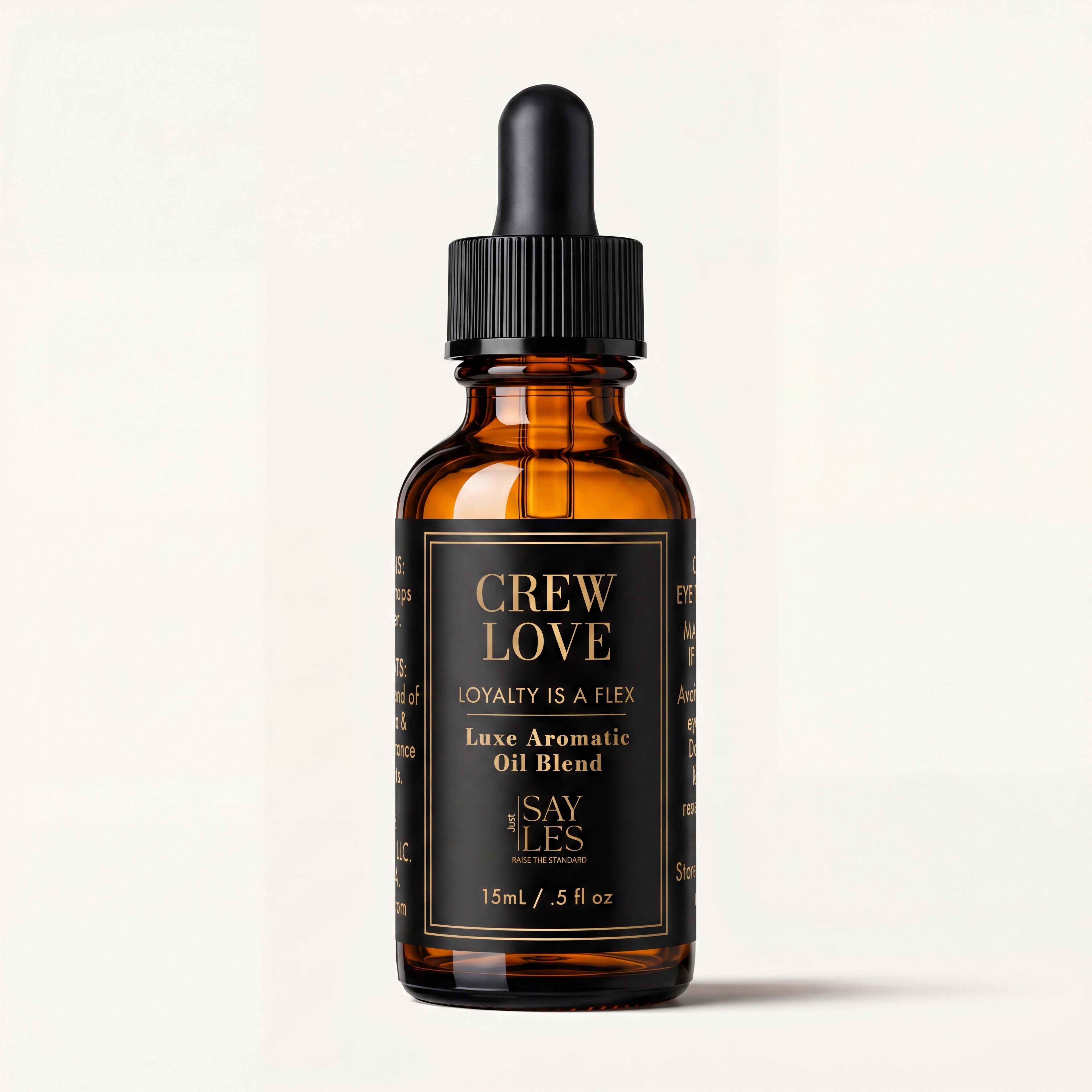 15ml amber glass dropper bottle of Crew Love Lux Oil Blend luxury diffuser oil on a minimal white background.