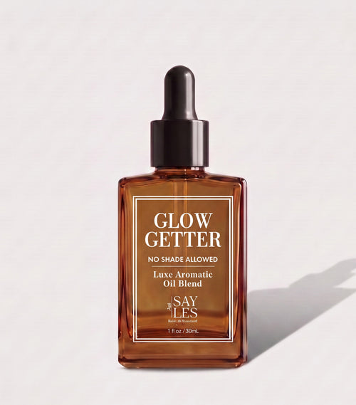 30ml square glass dropper bottle of Glow Getter Lux Oil Blend premium home fragrance on a minimalist light background with a soft shadow