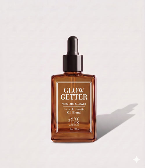 30ml square glass dropper bottle of Glow Getter Lux Oil Blend premium home fragrance on a minimalist light background with a soft shadow.