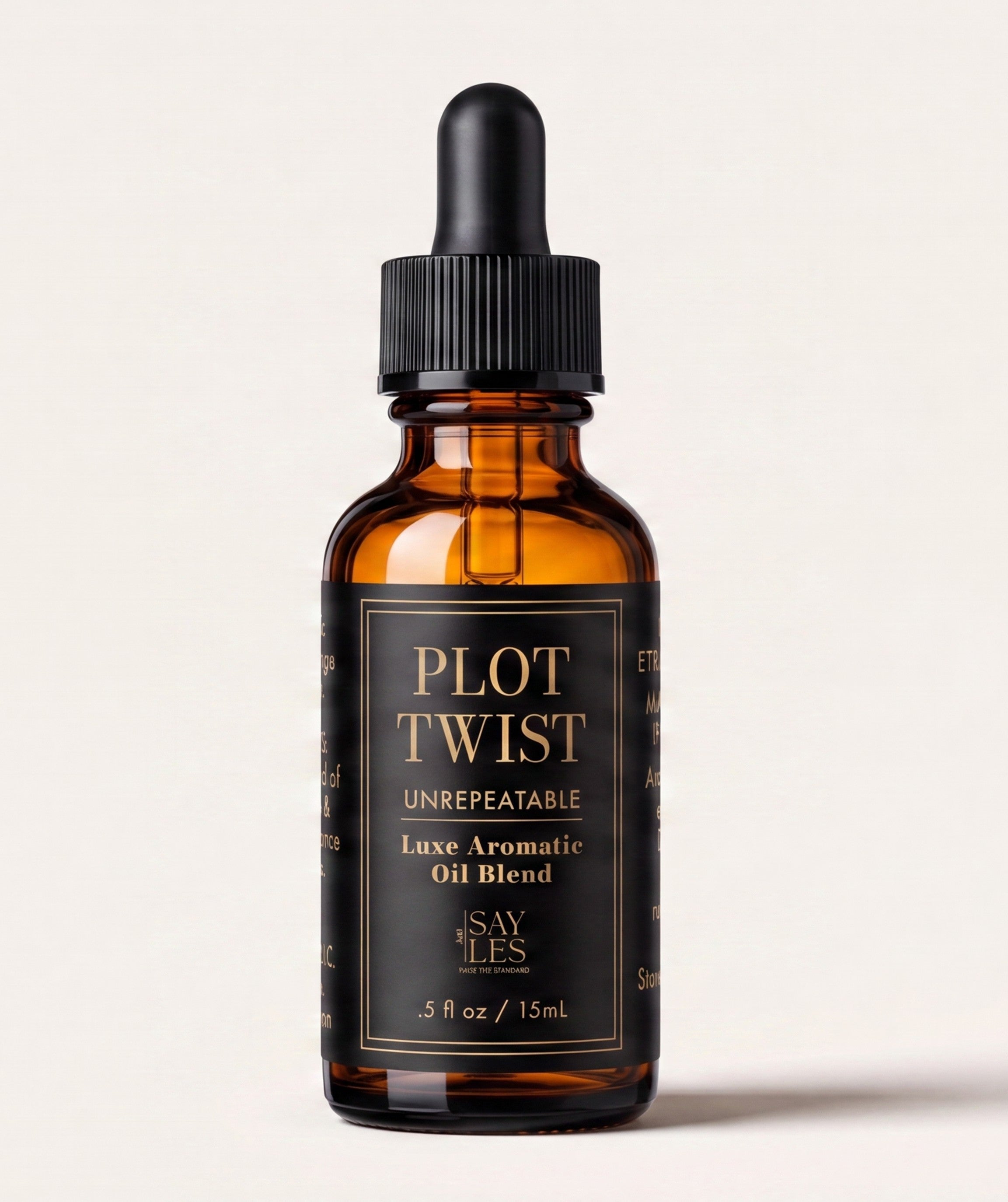 15ml glass dropper bottle of Plot Twist Lux Oil Blend luxury home fragrance on a minimal background.